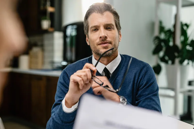 Property adviser considering the details of a client brief